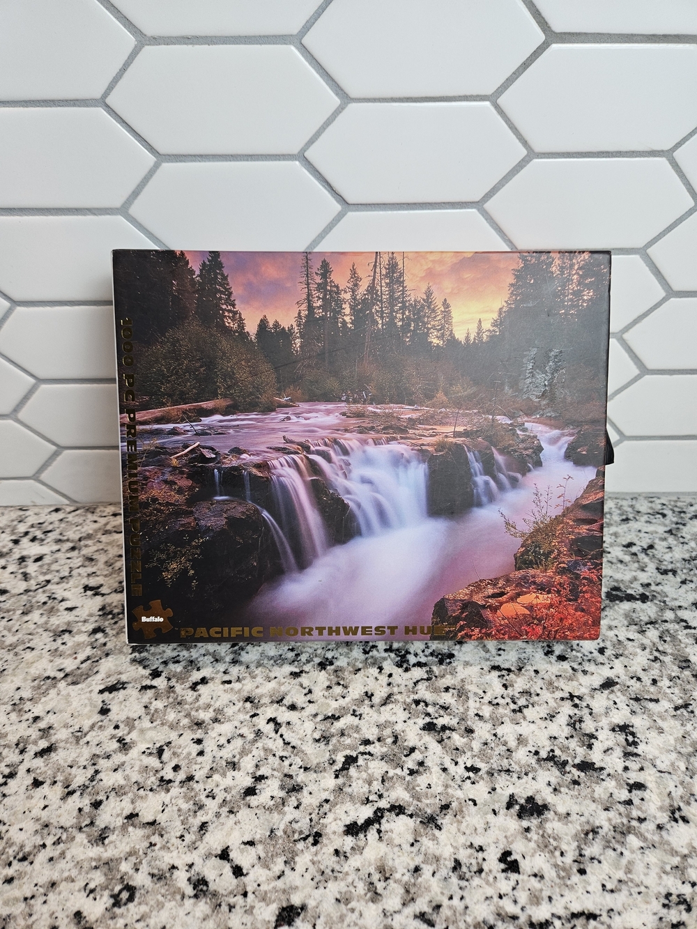Buffalo David Bitton 1000 Piece Puzzle in Sunset Colors Waterfall